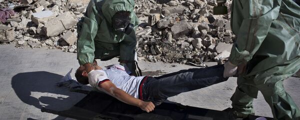 Voluntarios practican respuesta a un ataque químico, Alepo, Siria - Sputnik Mundo