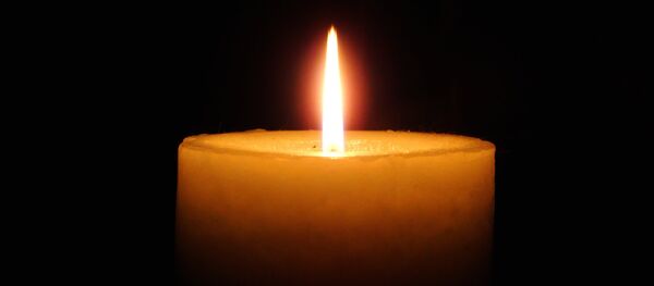 Un cirio - Sputnik Mundo