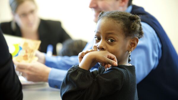 Niña afroamericana en una escuela de EEUU - Sputnik Mundo