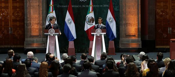 Los presidentes de Paraguay, Horacio Cartes, y de México, Enrique Peña Los presidentes de Paraguay, Horacio Cartes, y de México, Enrique Peña - Sputnik Mundo