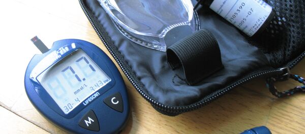 Un glucómetro - Sputnik Mundo