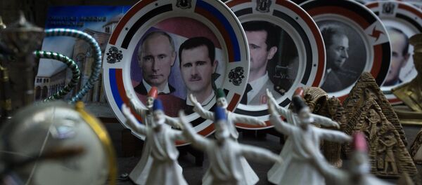 Retratos de Vladímir Putin y Bashar Asad (archivo) Retratos de Vladímir Putin y Bashar Asad (archivo) - Sputnik Mundo