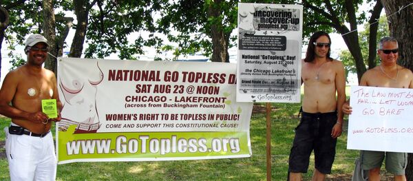 La marcha 'Go Topless Day' - Sputnik Mundo