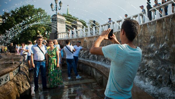 Unos turistas en Rusia - Sputnik Mundo