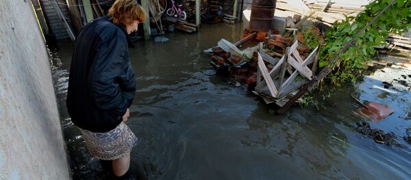 Una moradora de la región de Primorie avalia los estragos causados por el tifón Lionrock Una moradora de la región de Primorie avalia los estragos causados por el tifón Lionrock - Sputnik Mundo