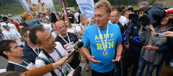 El portavoz de Putin corre durante 5 km en defensa de los tigres de Amur - Sputnik Mundo
