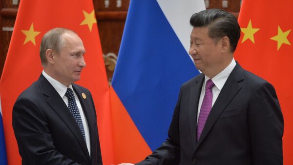 El presidente de Rusia, Vladímir Putin, y el presidente de China, Xi Jinping - Sputnik Mundo