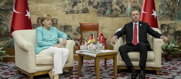 Angela Merkel, canciller alemana, y Recep Tayyip Erdogan, presidente de Turquía durante la reunión en el marco de la cumbre del G20 - Sputnik Mundo
