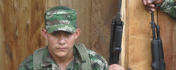 Guerrillero de las FARC (archivo) Guerrillero de las FARC (archivo) - Sputnik Mundo