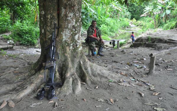 Guerrillero de las FARC Guerrillero de las FARC - Sputnik Mundo