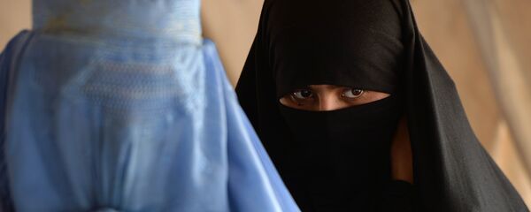 Mujeres en burka (imagen referencial) - Sputnik Mundo