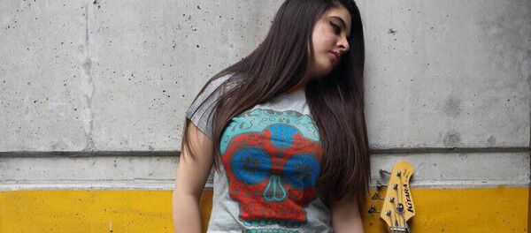 Las playeras de Coco Kris - Sputnik Mundo