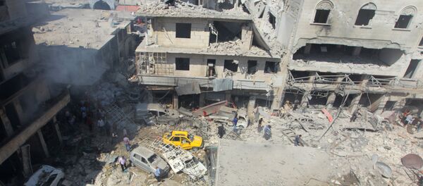 Las consecuencias del ataque aéreo en Idlib (archivo) - Sputnik Mundo