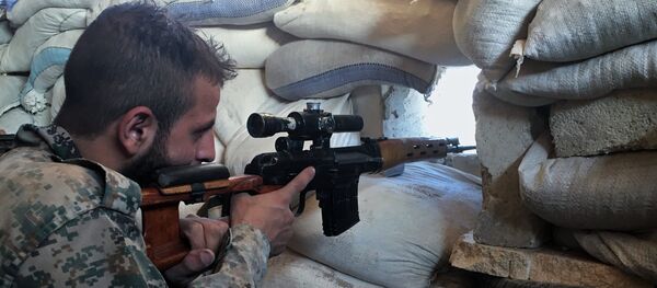 Un soldado del Ejército sirio - Sputnik Mundo