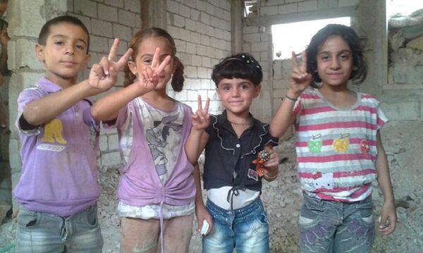 Los niños de las ciudades de Al Fuah y Kafarya - Sputnik Mundo
