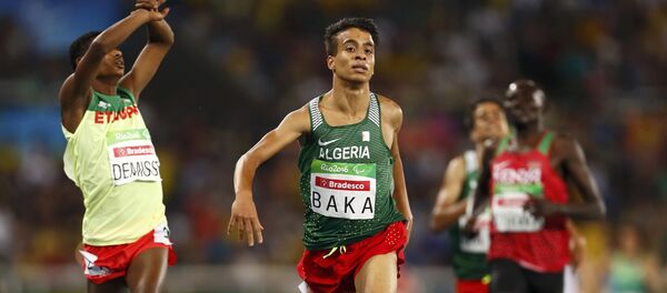 Abdellatif Baka (centro) - Sputnik Mundo