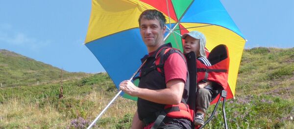 Un hombre con un hijo Un hombre con un hijo - Sputnik Mundo