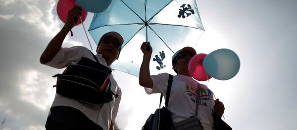Manifestación en contra de la propuesta del presidente Enrique Peña Nieto de legalizar el matrimonio igualitario Manifestación en contra de la propuesta del presidente Enrique Peña Nieto de legalizar el matrimonio igualitario - Sputnik Mundo