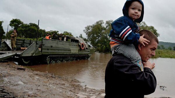 Las consecuencias de las inundaciones en la región rusa de Primorie causadas por el tifón Lionrock - Sputnik Mundo