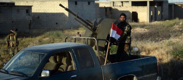 Un soldado del Ejército sirio - Sputnik Mundo