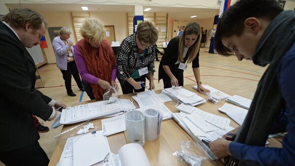 Uno de los colegios electorales en Rusia - Sputnik Mundo