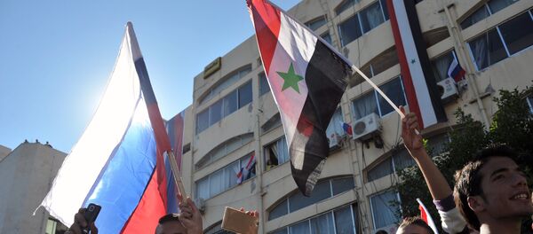 Un mitin en apoyo de la operación rusa en Siria - Sputnik Mundo