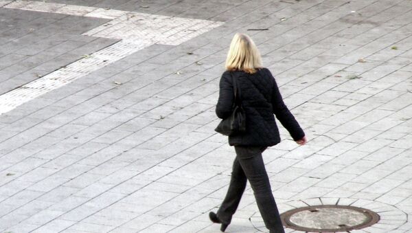 Una mujer - Sputnik Mundo