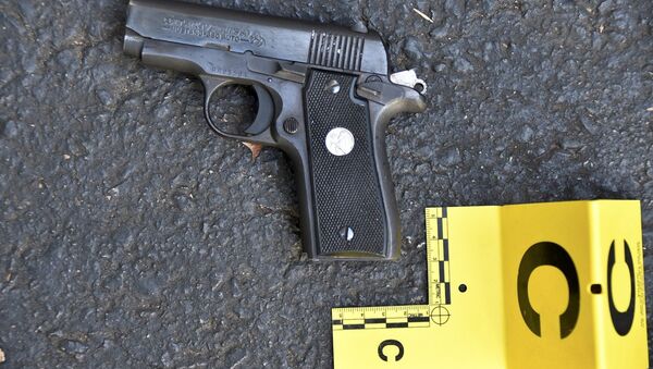 Pistola de Keith Lamont Scott - Sputnik Mundo