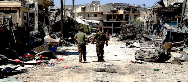 Los soldados del Ejército sirio en la parte de Alepo liberada de los terroristas - Sputnik Mundo