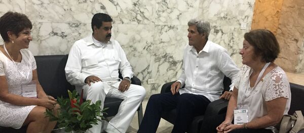 El presidente de Venezuela, Nicolás Maduro, y el secretario de Estado de EEUU, John Kerry - Sputnik Mundo