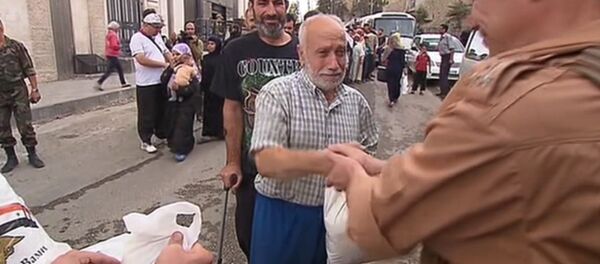 Entrega de ayuda humanitaria rusa en Alepo (archivo) - Sputnik Mundo