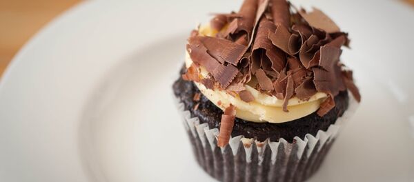 Un cupcake de chocolate - Sputnik Mundo