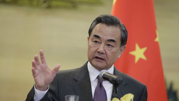 Wang Yi, ministro de Relaciones Exteriores de China - Sputnik Mundo