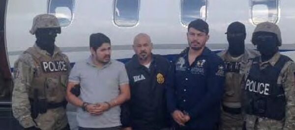 Efraín Antonio Campos Flores y Franqui Francisco Flores de Freitas - Sputnik Mundo