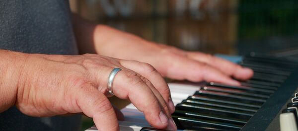 Un músico - Sputnik Mundo