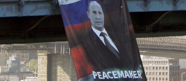Un cartel gigante del presidente de Rusia, Vladímir Putin, en Nueva York - Sputnik Mundo