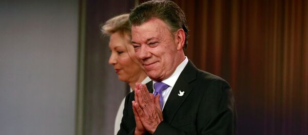 Juan Manuel Santos, presidente de Colombia, con su esposa - Sputnik Mundo