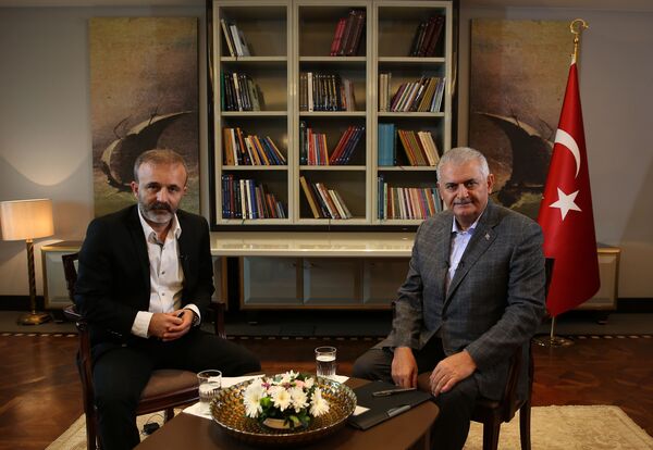 Primer ministro turco desvela los objetivos de su país en Siria en exclusiva a Sputnik - Sputnik Mundo