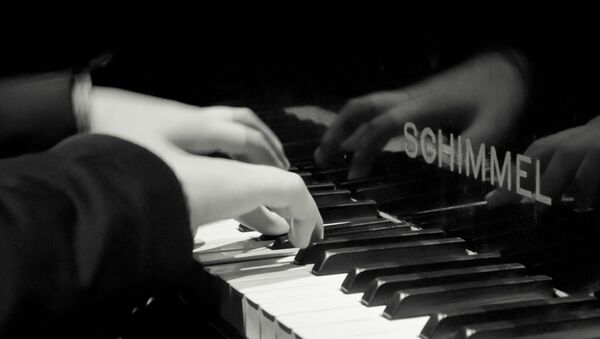 Un pianista - Sputnik Mundo