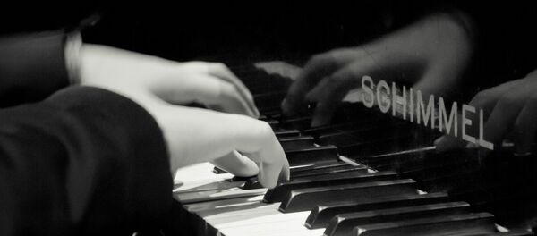 Un pianista - Sputnik Mundo