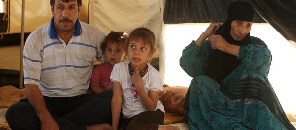 La gente que huyó de Mosul en campamento de refugiados Duhok, Irak - Sputnik Mundo