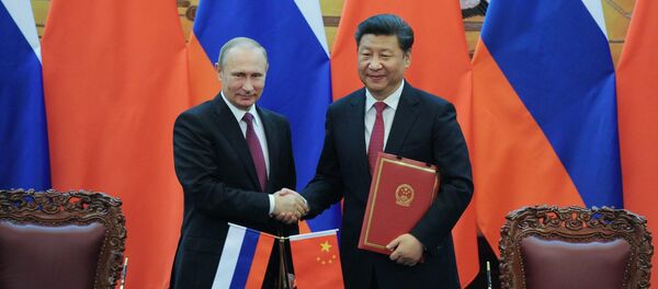 El presidente de Rusia, Vladímir Putin, y el presidente de China, Xi Jinping El presidente de Rusia, Vladímir Putin, y el presidente de China, Xi Jinping - Sputnik Mundo