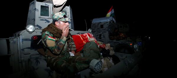 Combatientes de peshmerga durante las preparaciones del ataque en Mosul, Irak Combatientes de peshmerga durante las preparaciones del ataque en Mosul, Irak - Sputnik Mundo