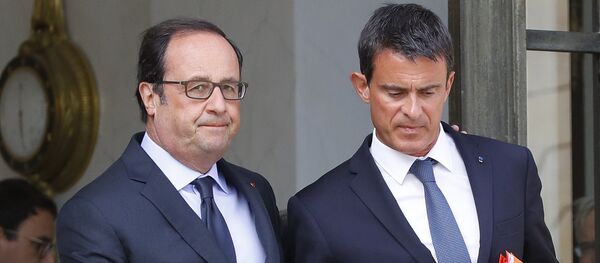 Francois Hollande y Manuel Valls - Sputnik Mundo
