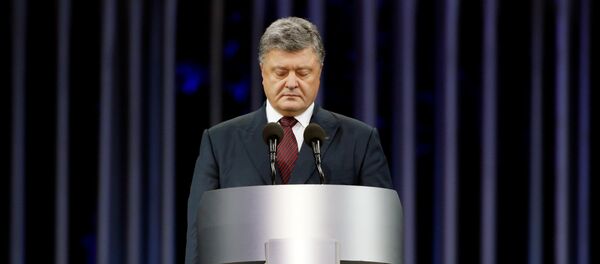Ukrainian President Poroshenko attends ceremony commemorating victims of Babyn Yar in Kiev - Sputnik Mundo