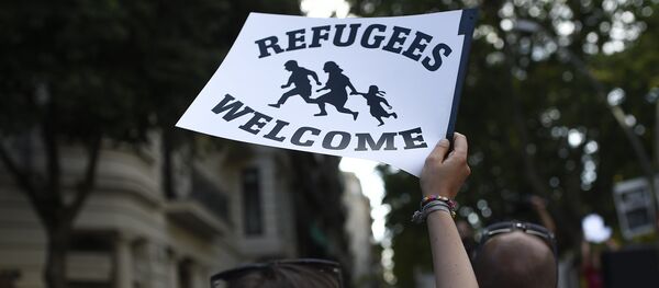 Manifestación en solidaridad con los refugiados en España - Sputnik Mundo
