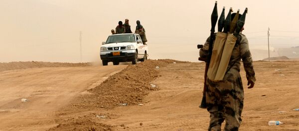 El grupo kurdo Peshmerga cerca de Mosul El grupo kurdo Peshmerga cerca de Mosul - Sputnik Mundo