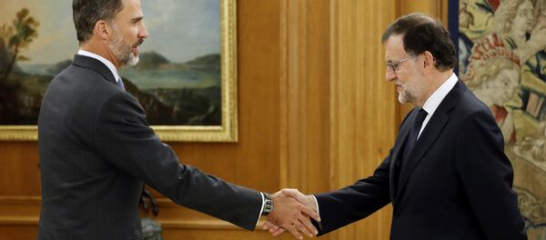 El Rey Felipe VI y el primer ministro de España, Mariano Rajoy - Sputnik Mundo