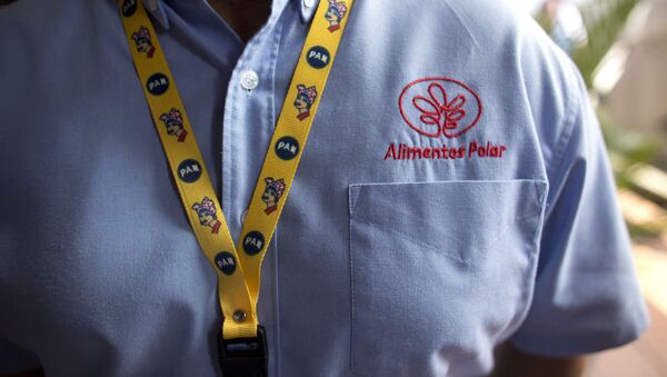 Un empleado de Empresas Polar Un empleado de Empresas Polar - Sputnik Mundo