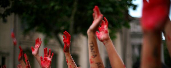 Marcha contra la violencia de género (archivo) - Sputnik Mundo